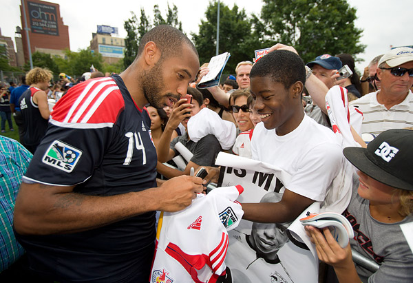 Thierry Henry and the Red Bulls sign autographs for the throngs of fans in attendance