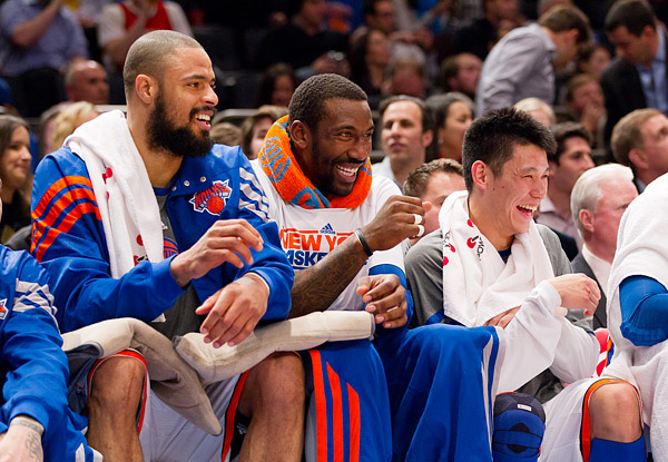 Tyson Chandler, Amar'e Stoudemire and Jeremy Lin share a laugh on the Knicks bench