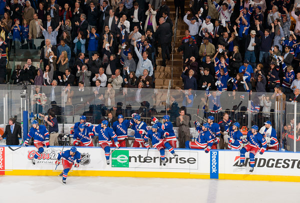The Garden crowd erupts and the Rangers storm off the bench after the final buzzer seals the series victory